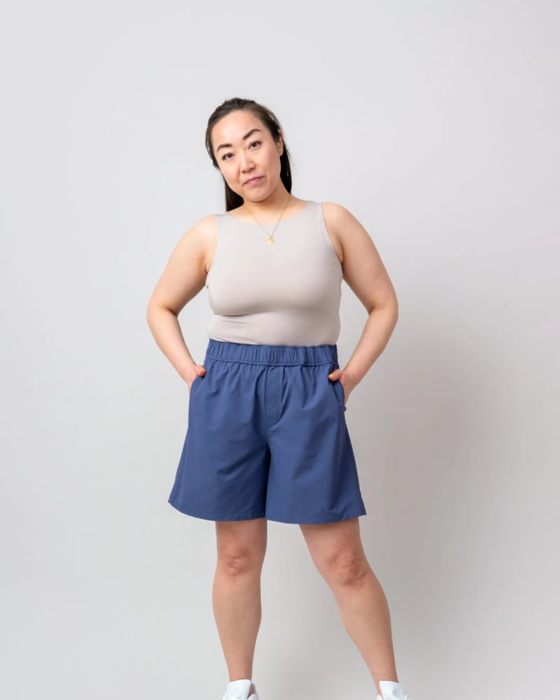 Front of a model wearing a size 2X surf's up shorts (7") in Moonlit Ocean by alder apparel. | dia_product_style_image_id:300636